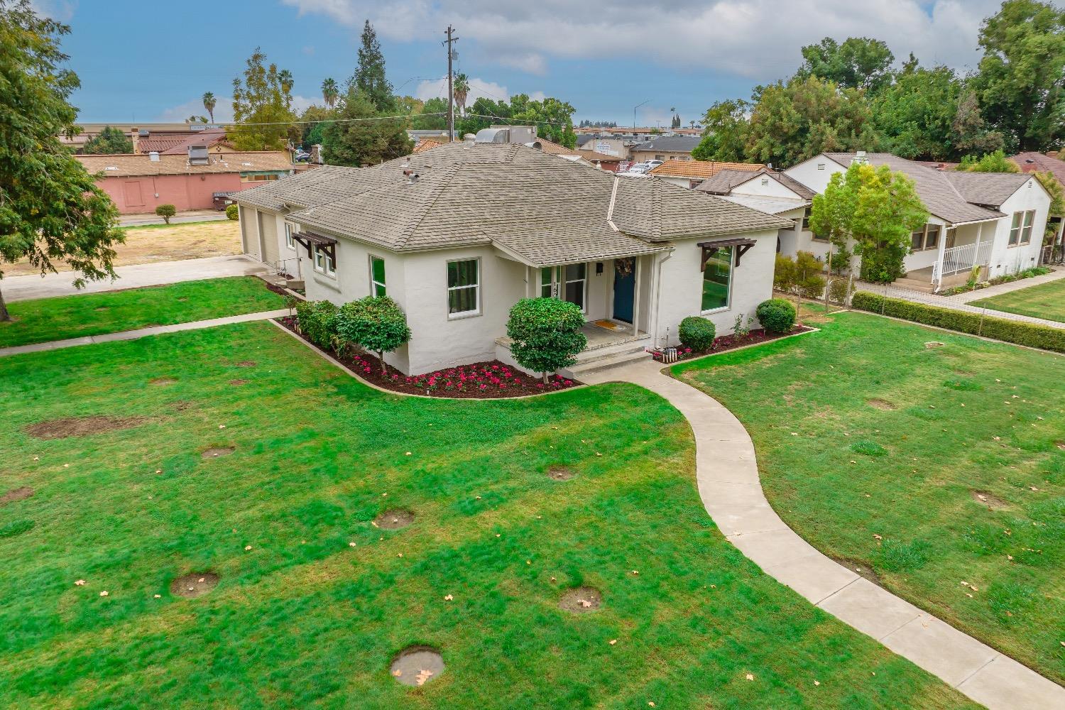 1600 West 5th Street Madera, CA 93637 - Photo 38 of 46 a aerial view of a house with garden