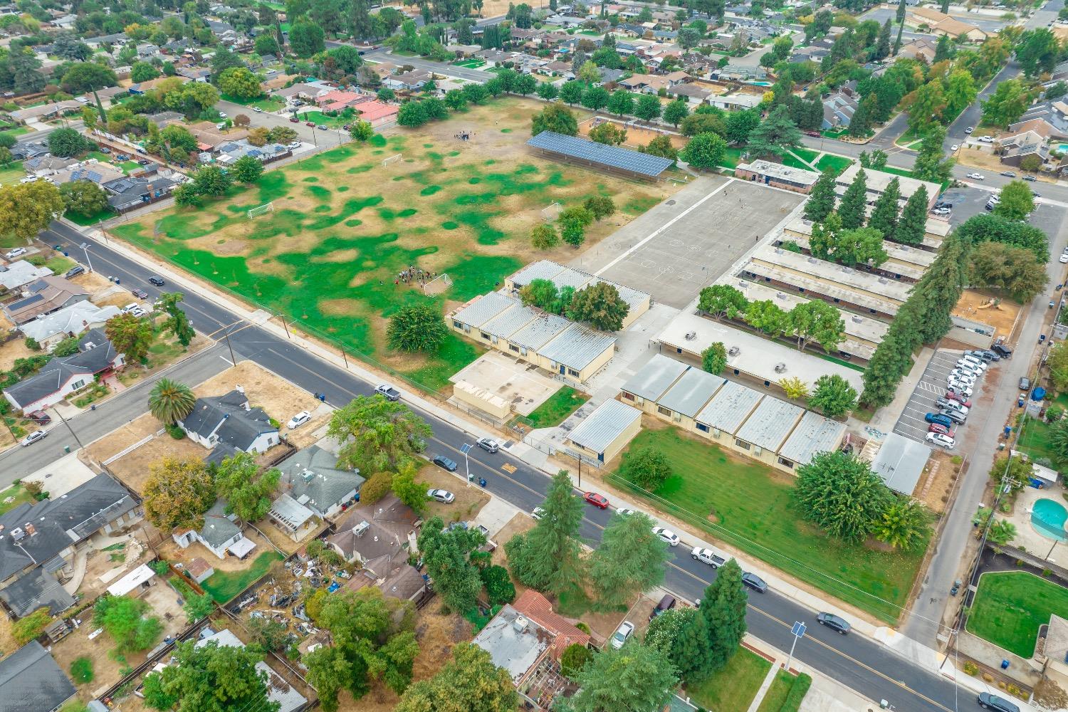 1600 West 5th Street Madera, CA 93637 - Photo 46 of 46 an aerial view of residential houses with outdoor space