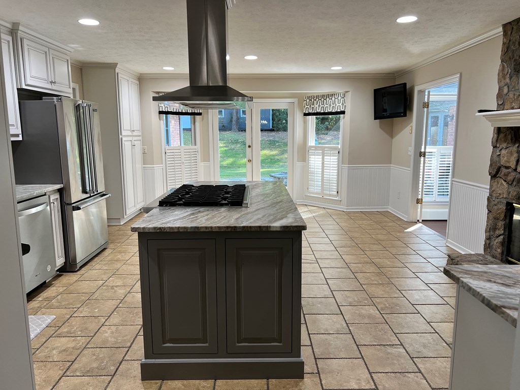 488 Blue Bird Trail Fortson, GA 31808 - Photo 20 of 45 a kitchen with stainless steel appliances granite countertop a refrigerator and a stove