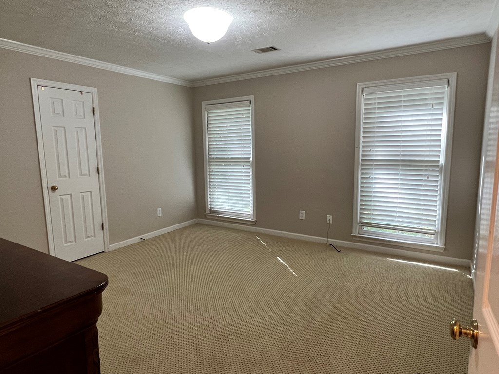 488 Blue Bird Trail Fortson, GA 31808 - Photo 36 of 45 an empty room with windows