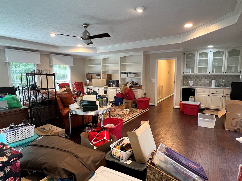 488 Blue Bird Trail Fortson, GA 31808 - Photo 39 of 45 a living room with furniture and a wooden floor