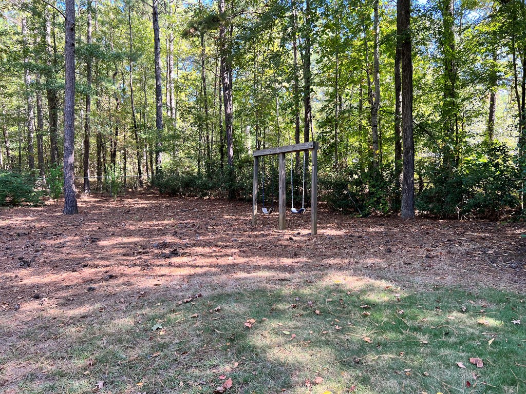 488 Blue Bird Trail Fortson, GA 31808 - Photo 43 of 45 a backyard of a house with lots of green space