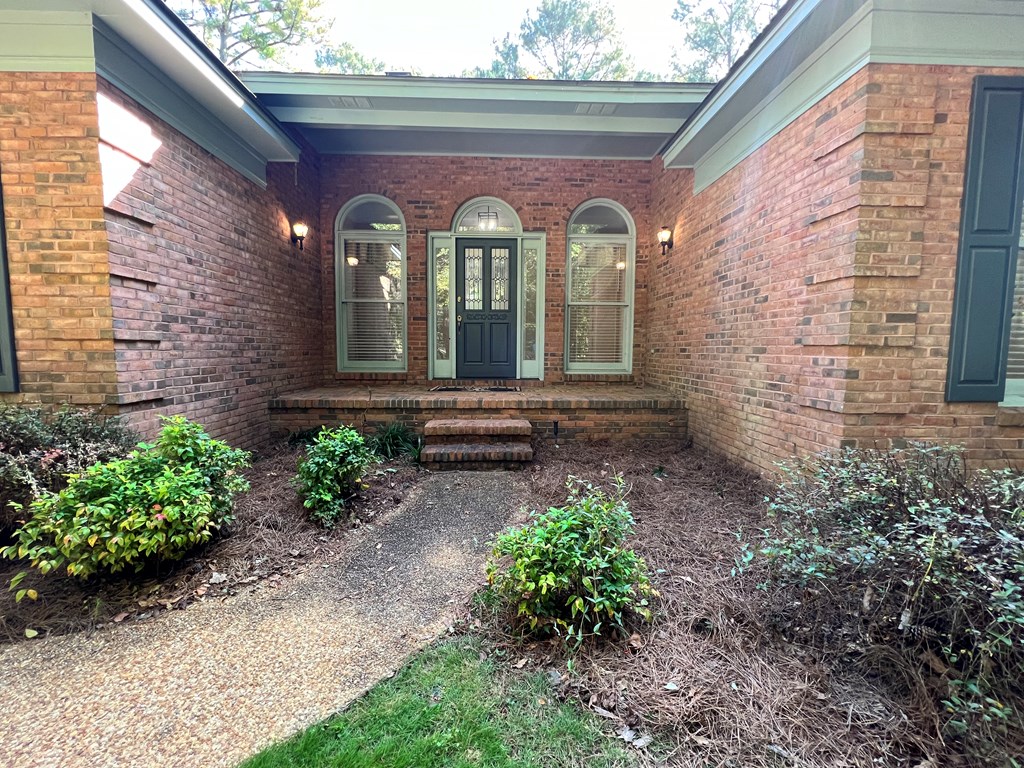 488 Blue Bird Trail Fortson, GA 31808 - Photo 6 of 45 a front view of a house with garden