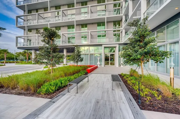 front view of a building with a yard