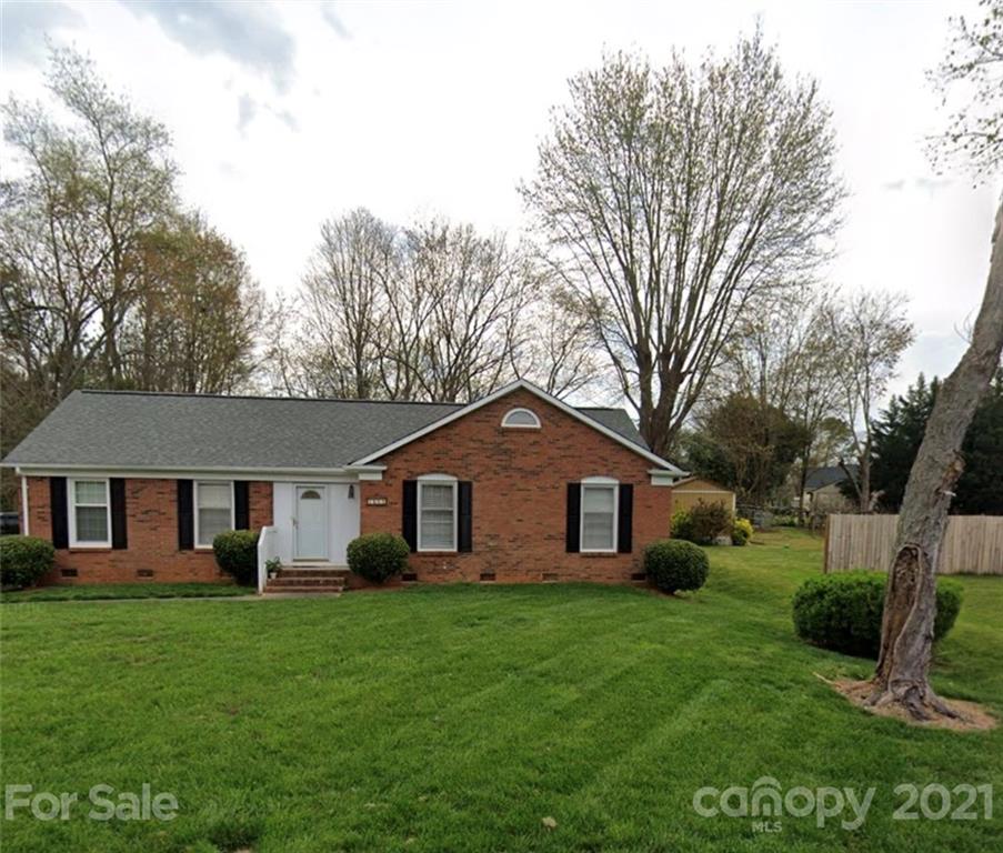 6111 Powder Horn Road Charlotte, NC 28212 - Photo 1 of 1 a front view of a house with a garden