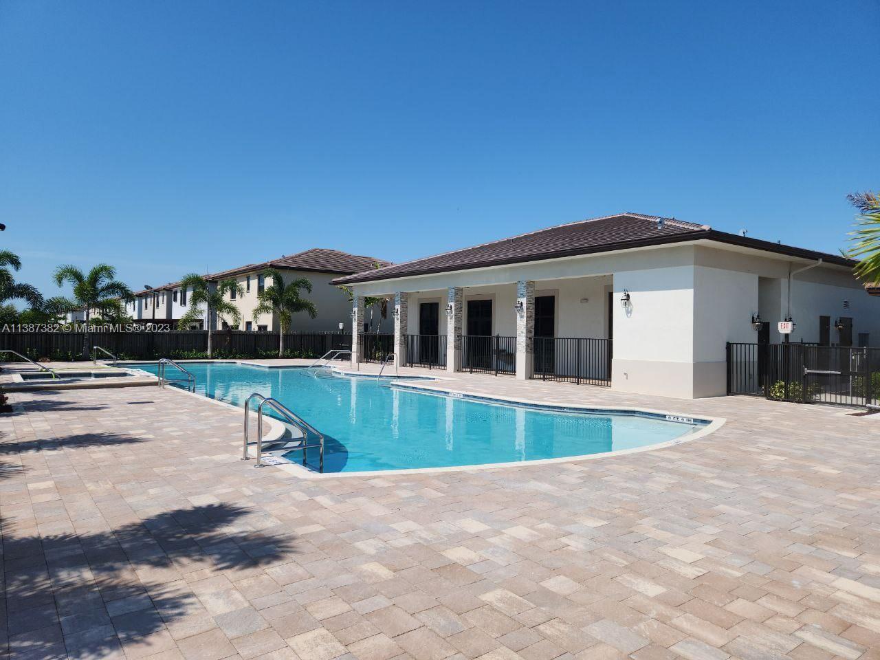 25151 Southwest 108th Court Homestead, FL 33032 - Photo 15 of 15 a front view of house with yard and green space