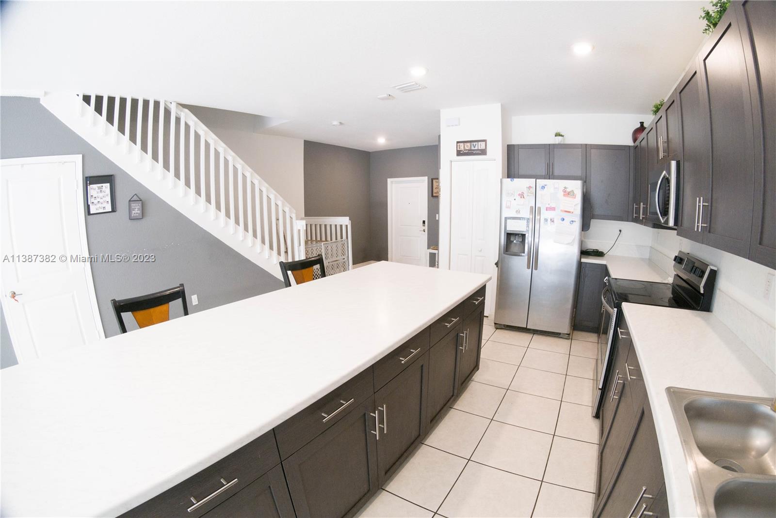 25151 Southwest 108th Court Homestead, FL 33032 - Photo 4 of 15 a living room with furniture