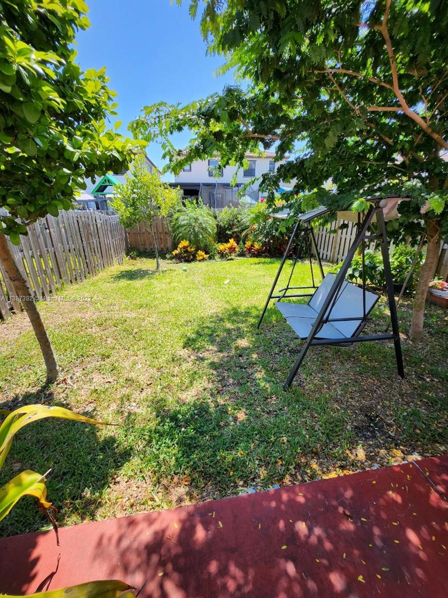 25151 Southwest 108th Court Homestead, FL 33032 - Photo 8 of 15 a view of an outdoor space and yard