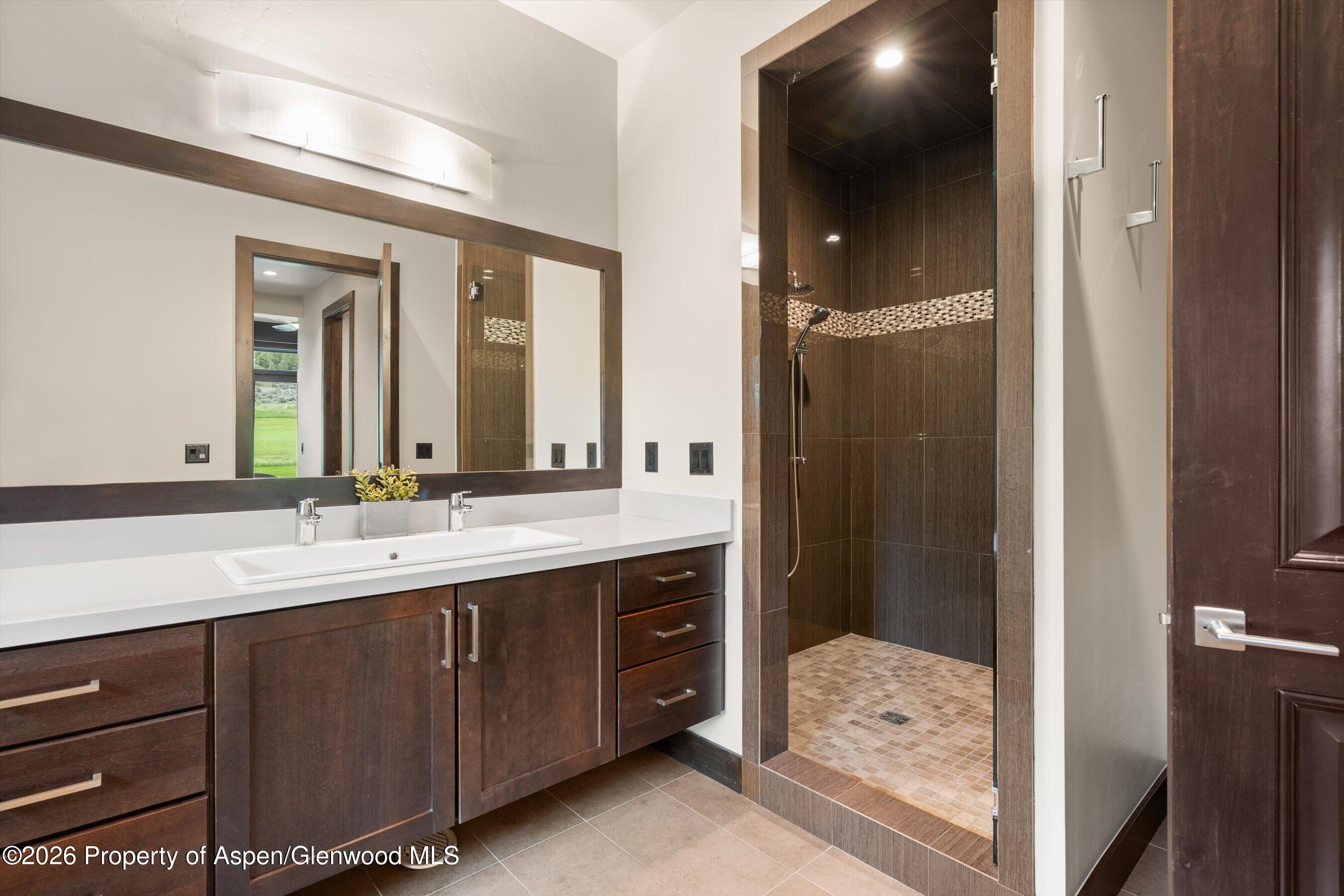 285 Saddleback Road Carbondale, CO 81623 - Photo 27 of 55 primary bathroom double sinks and shower