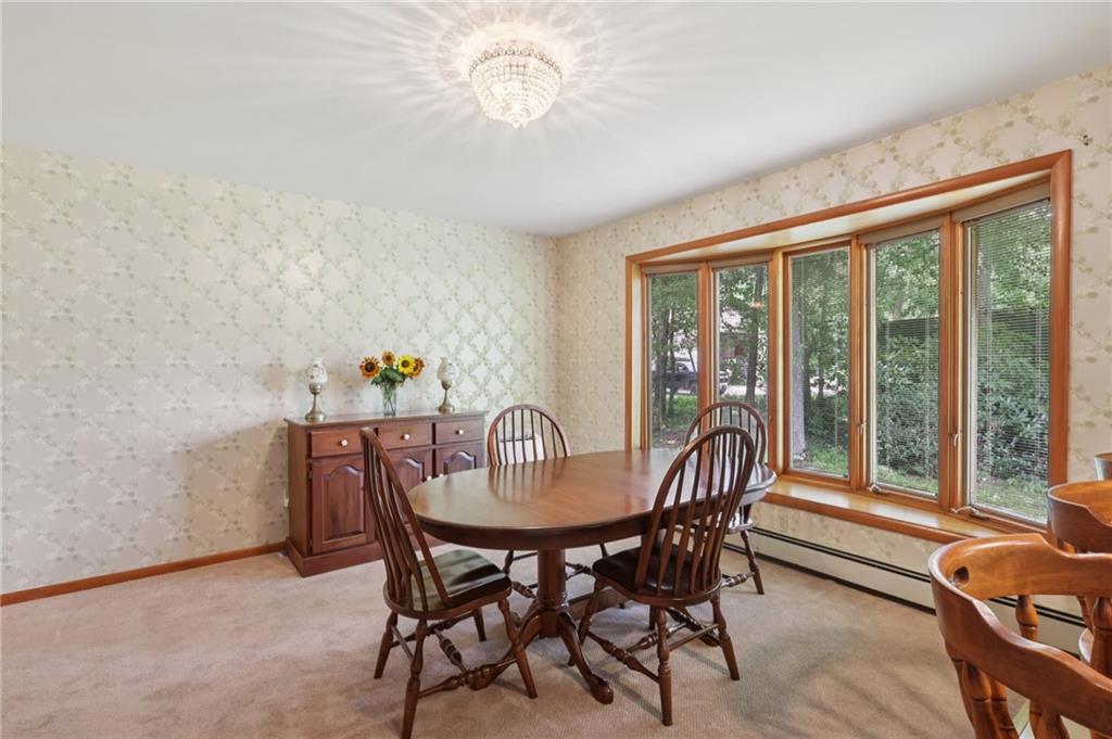 100 Joshua Drive Harmony, PA 16037 - Photo 11 of 39 a view of a dining room with furniture window and outside view
