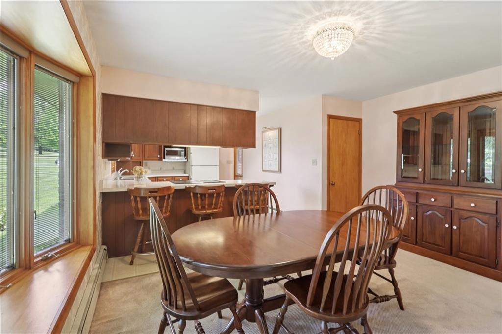100 Joshua Drive Harmony, PA 16037 - Photo 13 of 39 a dining room with furniture and window