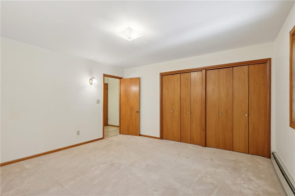 100 Joshua Drive Harmony, PA 16037 - Photo 17 of 39 a view of an empty room with wooden floor