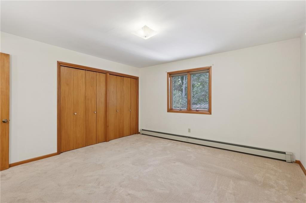 100 Joshua Drive Harmony, PA 16037 - Photo 18 of 39 a view of an empty room with a window