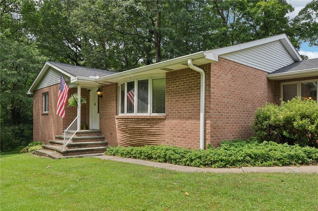 100 Joshua Drive Harmony, PA 16037 - Photo 2 of 39 a front view of house with stairs