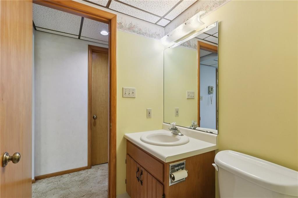 100 Joshua Drive Harmony, PA 16037 - Photo 24 of 39 a bathroom with a sink a toilet and shower