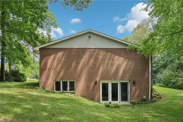 front view of house with a yard
