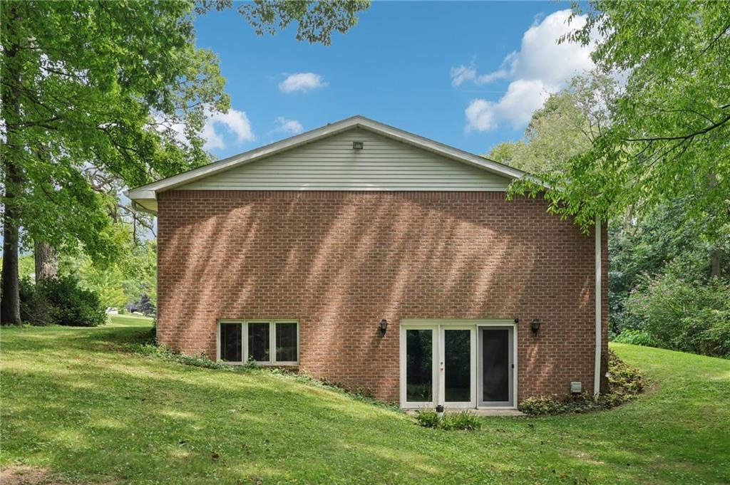 100 Joshua Drive Harmony, PA 16037 - Photo 29 of 39 front view of house with a yard