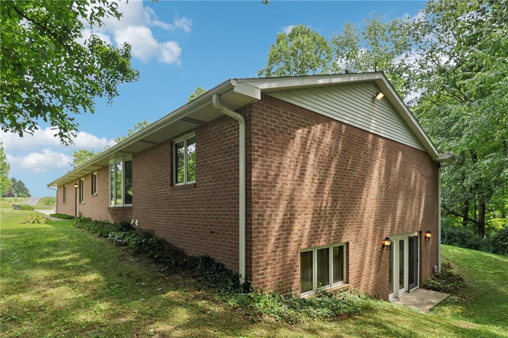 100 Joshua Drive Harmony, PA 16037 - Photo 30 of 39 a backyard of a house with lots of green space
