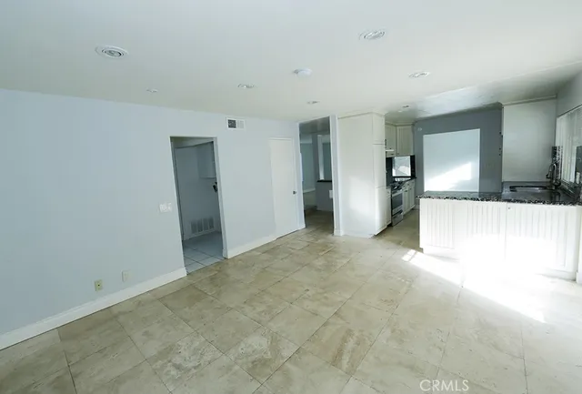 a view of a big room with closet and cabinet