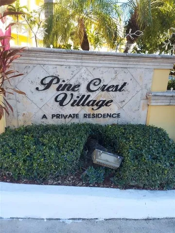 a wooden door with a tree