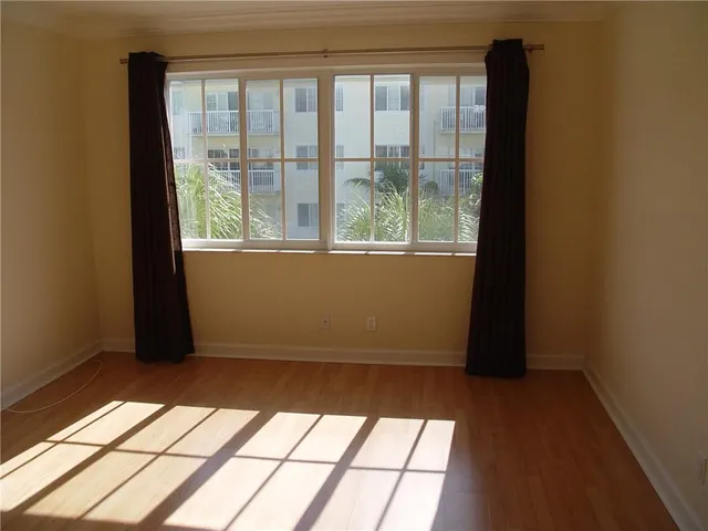 a view of an empty room and window