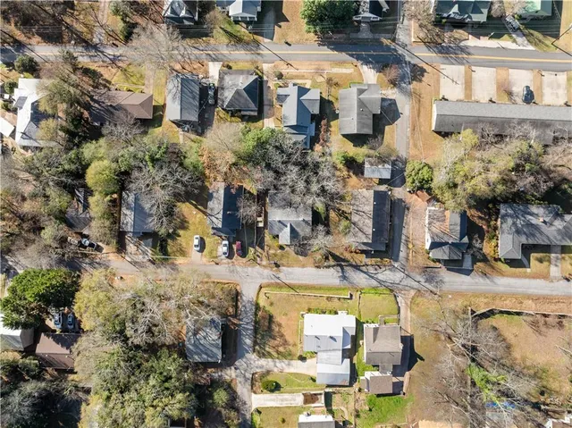 a view of multiple houses with outdoor space