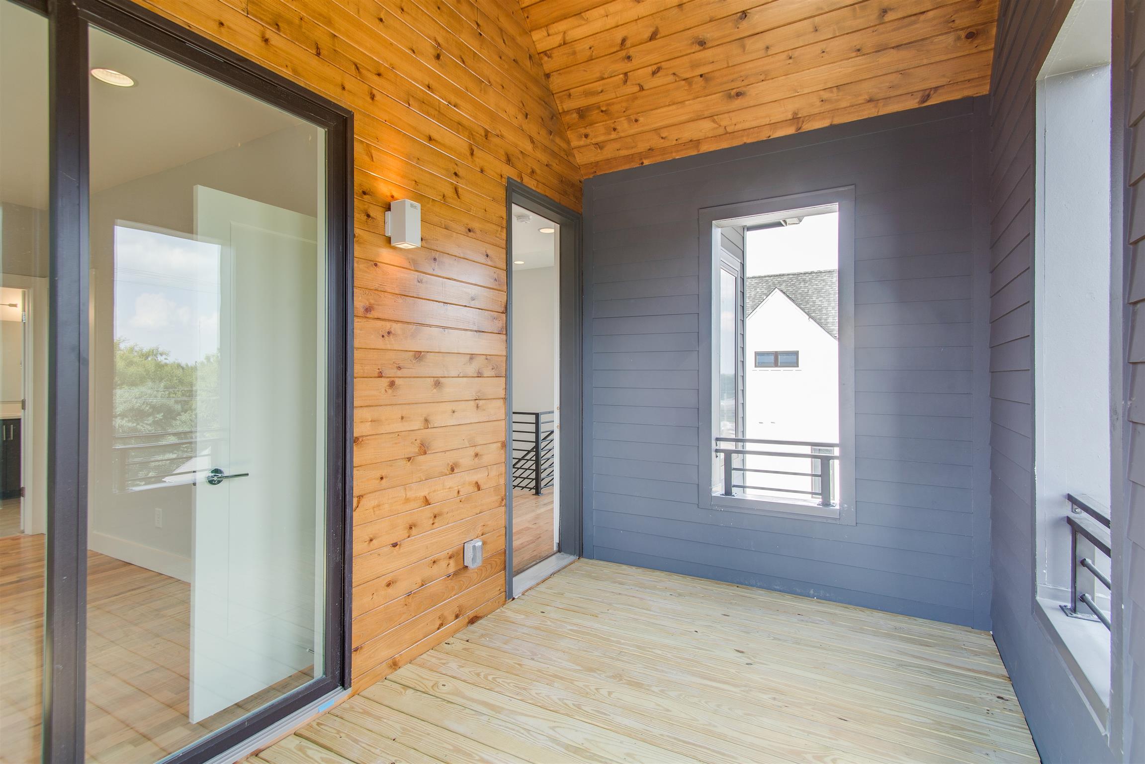 119 A Rains Avenue Nashville, TN 37203 - Photo 20 of 25 a view of hallway with window and wooden floor