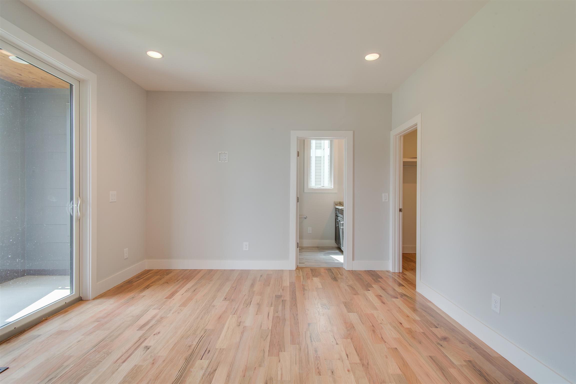 119 A Rains Avenue Nashville, TN 37203 - Photo 4 of 25 a view of empty room with wooden floor