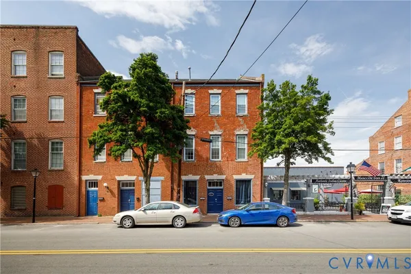 a cars parked in front of a building