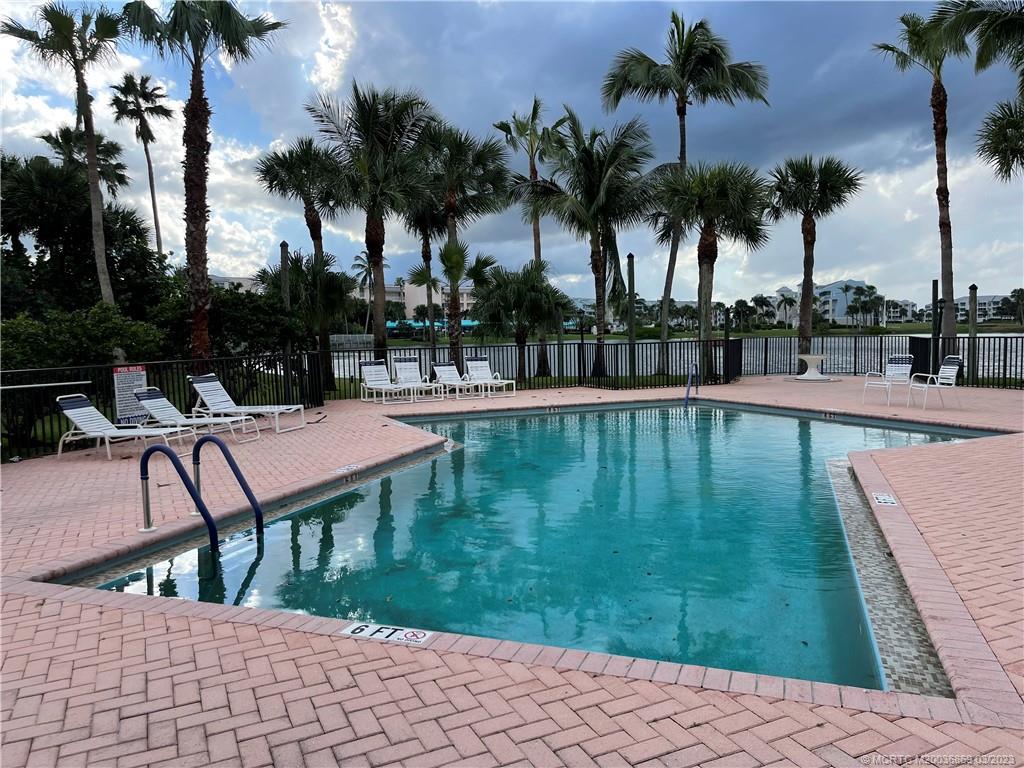 221 Northeast Plantation Road, Unit 202 Stuart, FL 34996 - Photo 17 of 22 Community Heated Pool