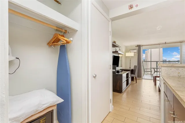 a view of a kitchen from the hallway