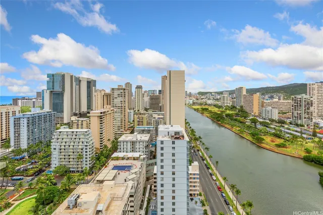 a view of a city with tall buildings