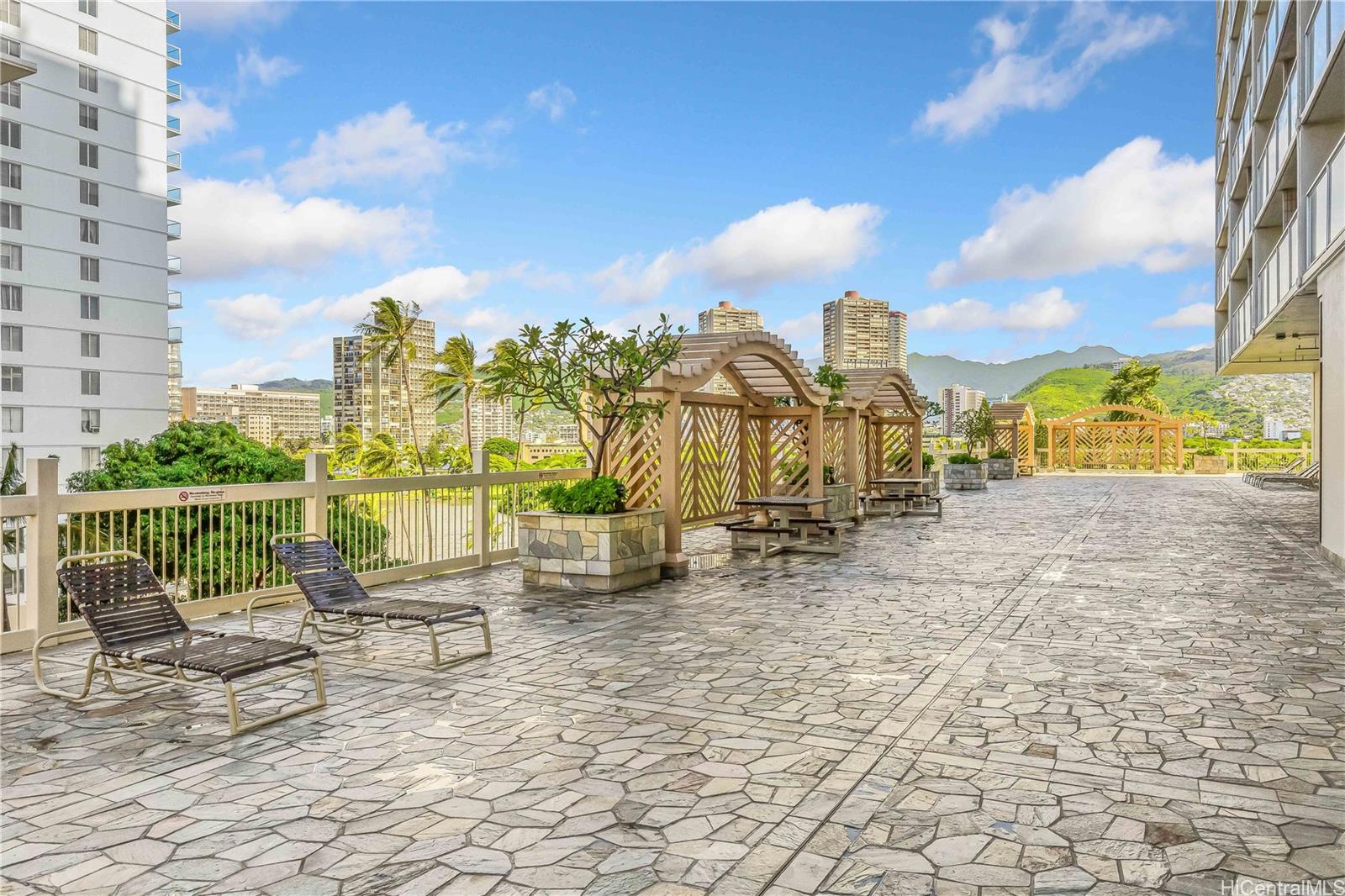 445 Seaside Avenue, Unit 2804 Honolulu, HI 96815 - Photo 24 of 25 a view of a terrace with sitting area