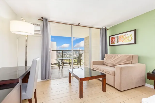 a living room with furniture and a table