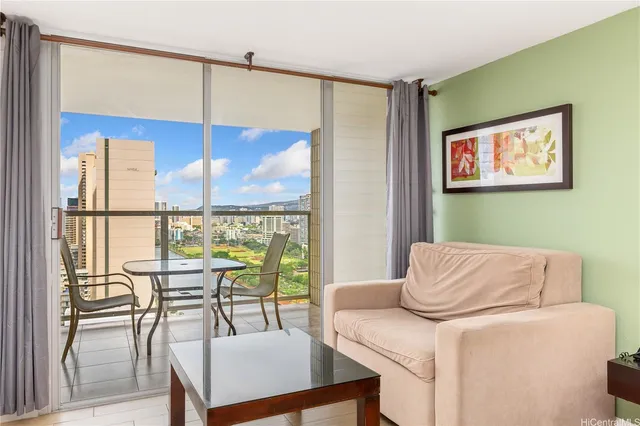 a living room with furniture and a window
