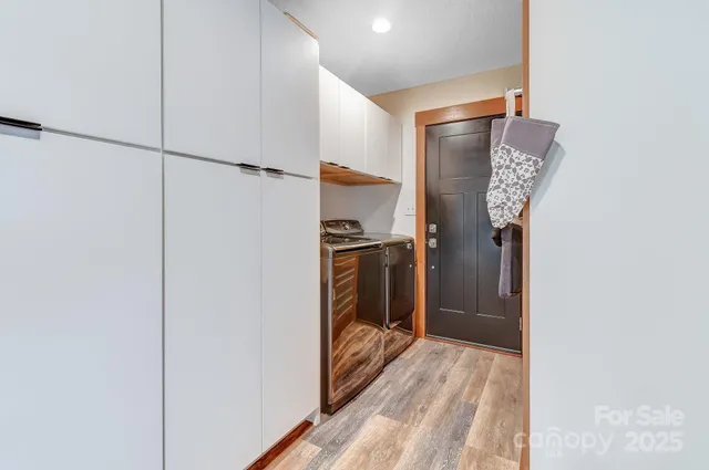 a view of a dining room with furniture and window
