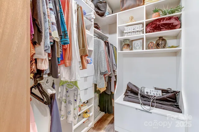 a house view with a seating space and garden space