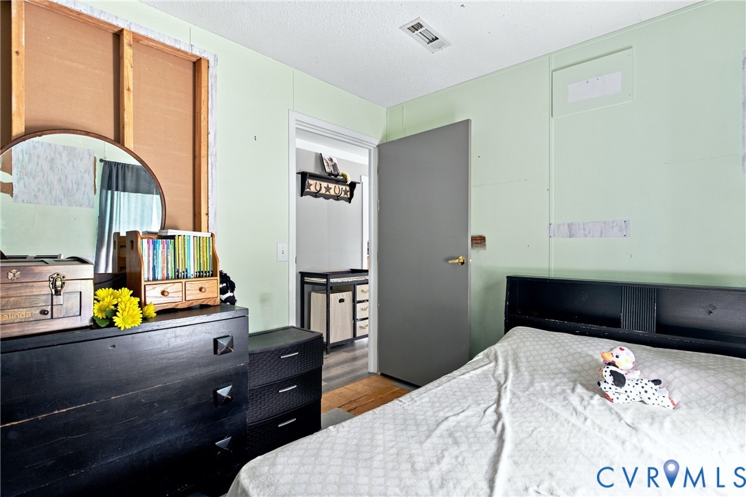1451 Dixie Hill Road Dillwyn, VA 23936 - Photo 20 of 51 Interior room featuring light green walls, a white