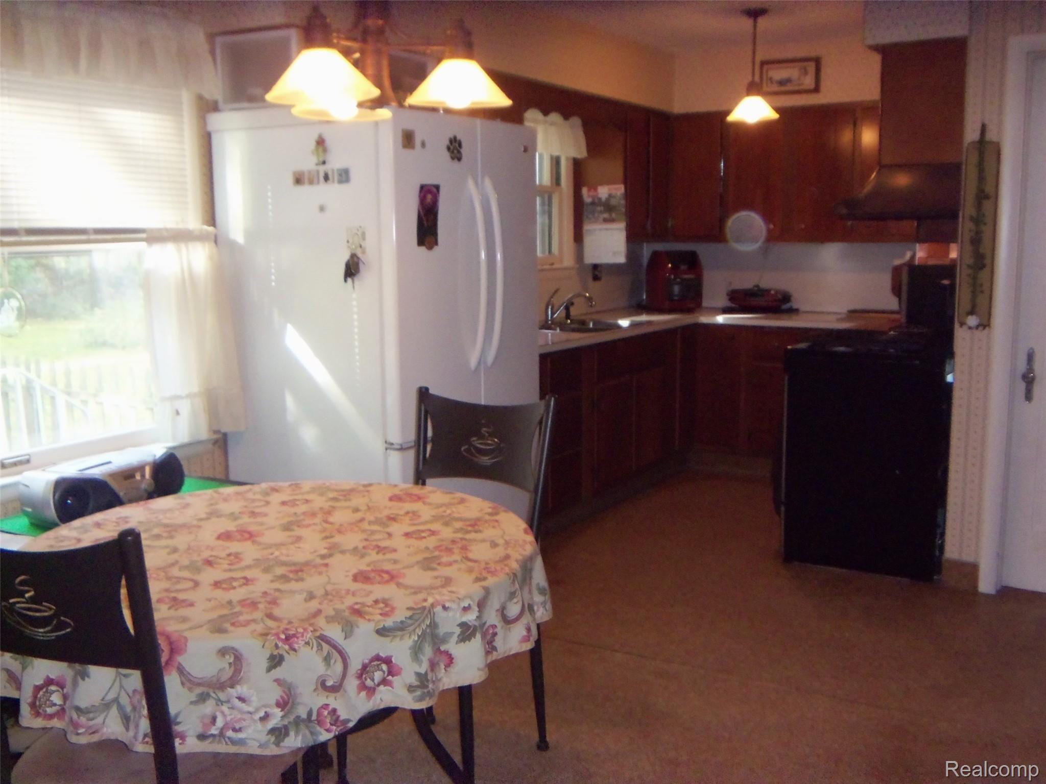 1451 Glen Road Howell, MI 48843 - Photo 9 of 21 Dining area open to kitchen