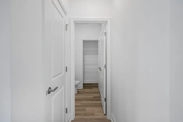 a bathroom with a toilet and a sink