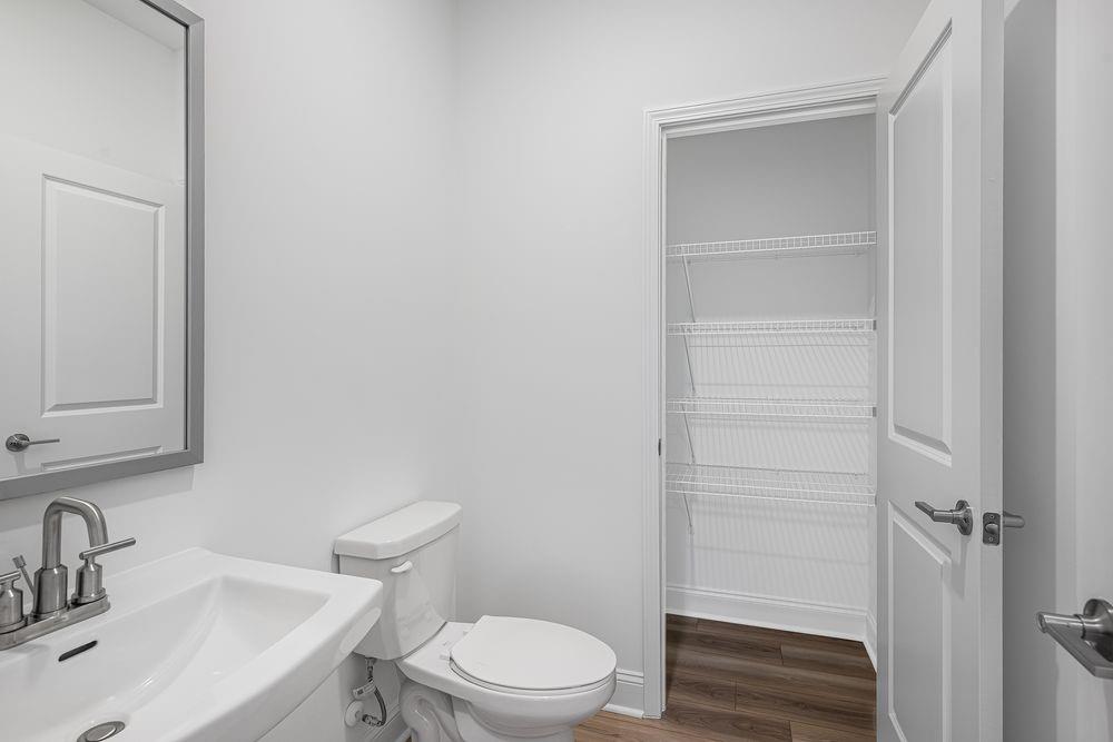 3299 Shirecrest Lane Dacula, GA 30019 - Photo 13 of 38 a bathroom with a toilet and a sink