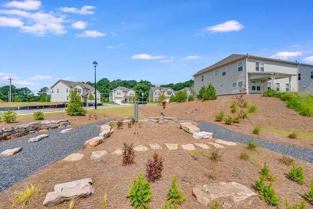 3299 Shirecrest Lane Dacula, GA 30019 - Photo 37 of 38 a view of a street with a house