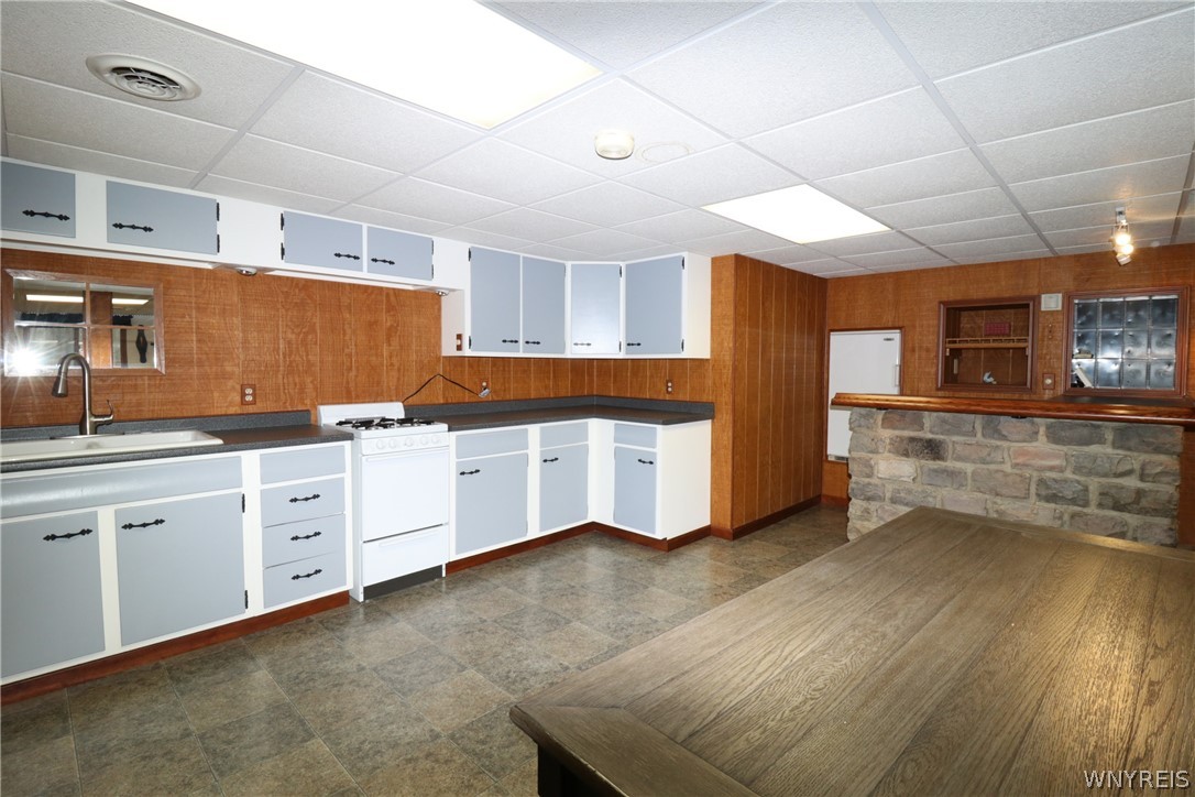 13869 Henskee Road Alden, NY 14004 - Photo 25 of 40 Bar and kitchen area in basement.