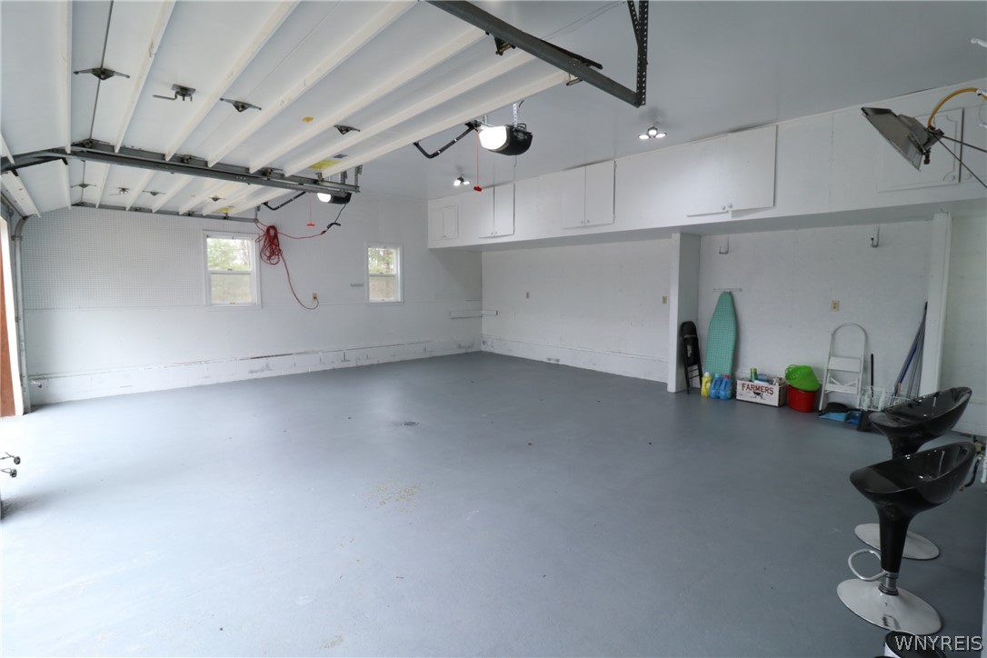 13869 Henskee Road Alden, NY 14004 - Photo 38 of 40 Large oversize garage with lots of storage.