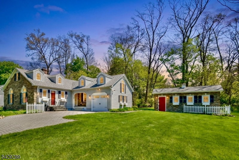 16 Pequot Trail Oak Ridge, NJ 07438 - Photo 18 of 18 a view of a white house with a big yard and large trees