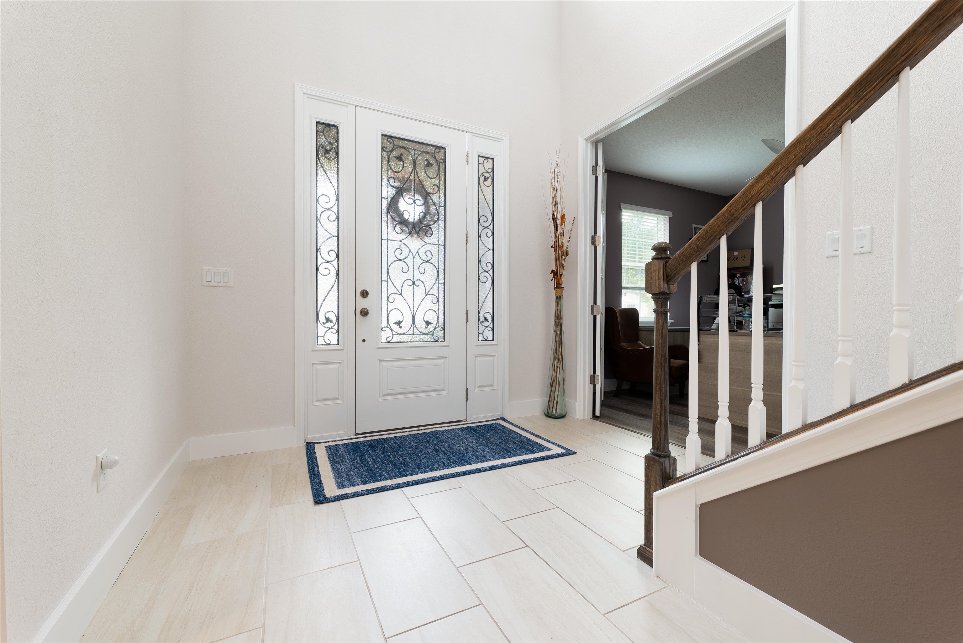 392 Downs Corner Road St. Augustine, FL 32092 - Photo 4 of 55 an empty room with windows