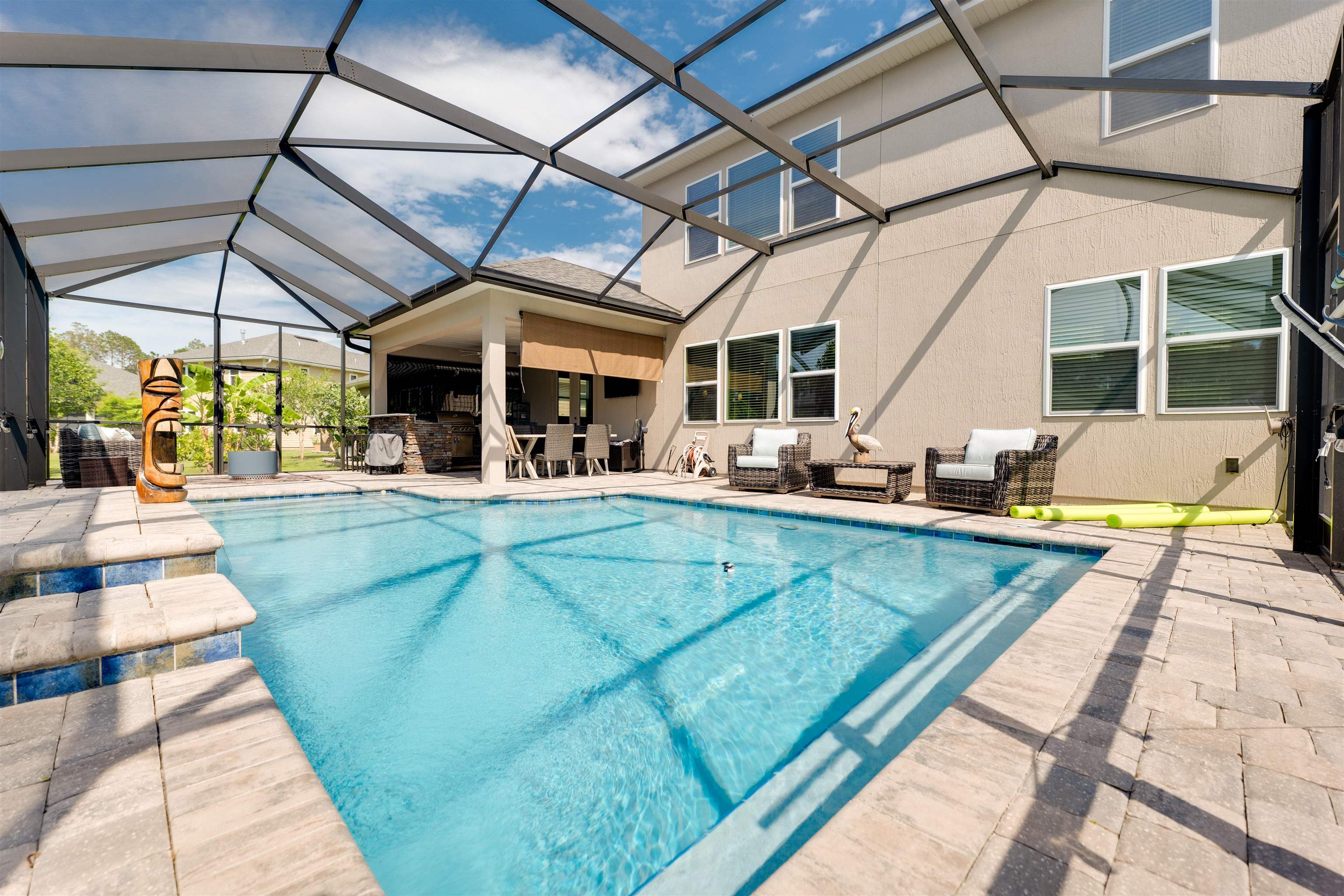 392 Downs Corner Road St. Augustine, FL 32092 - Photo 41 of 55 a view of a swimming pool with a patio