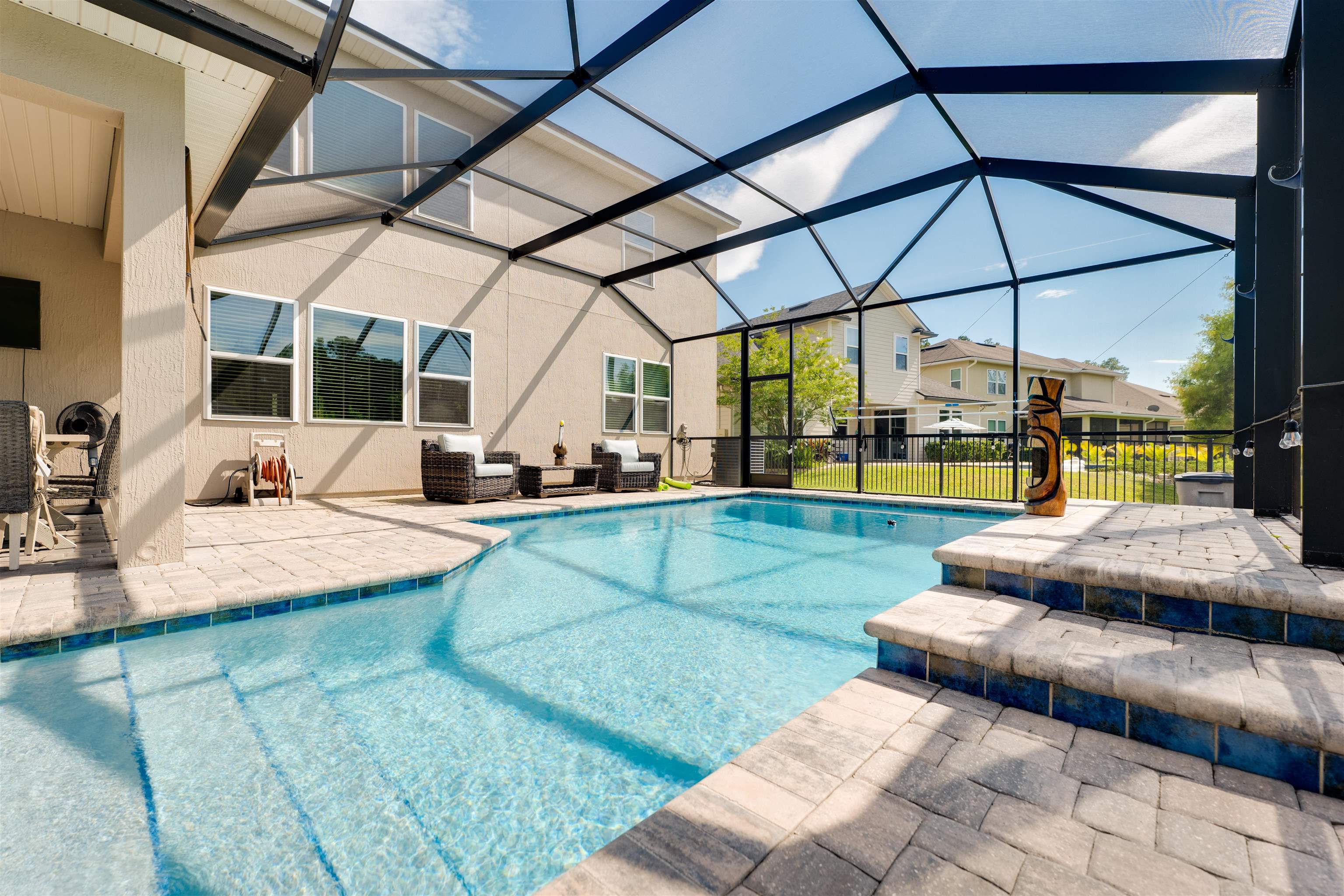 392 Downs Corner Road St. Augustine, FL 32092 - Photo 43 of 55 a view of a swimming pool with a patio