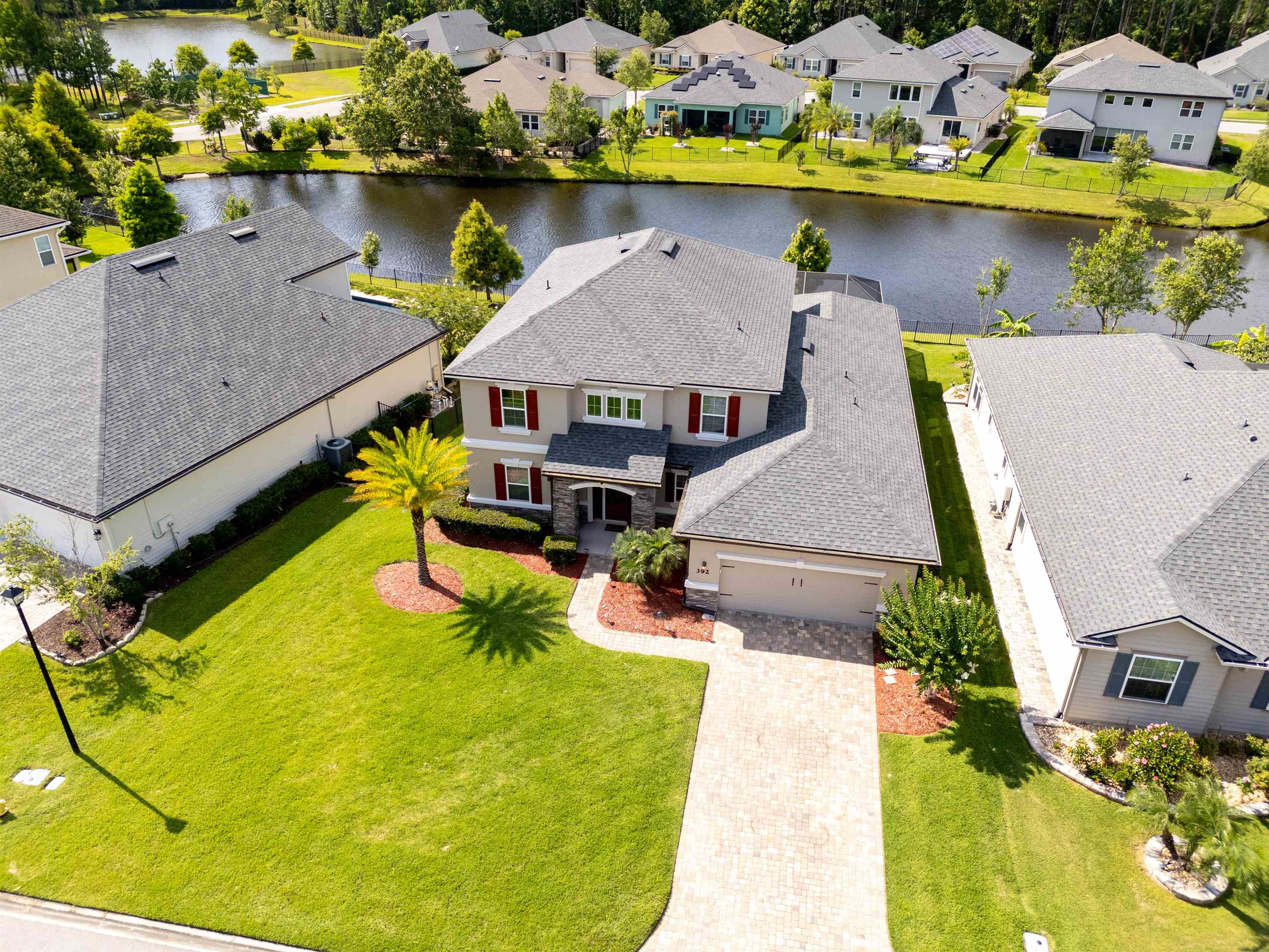 392 Downs Corner Road St. Augustine, FL 32092 - Photo 46 of 55 an aerial view of a house with a swimming pool