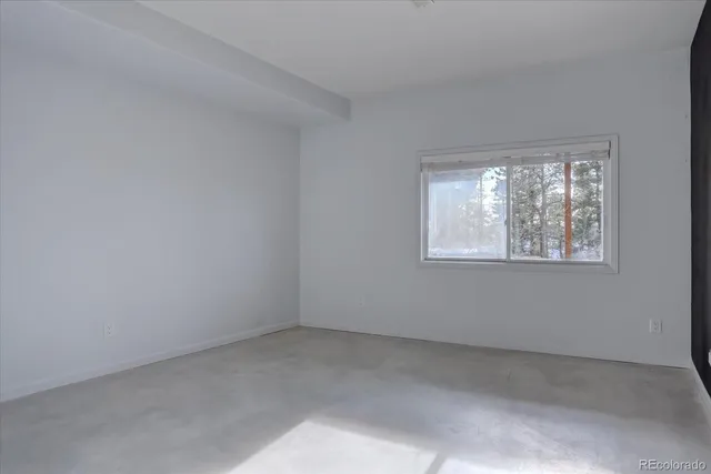 a balcony view with hardwood floor